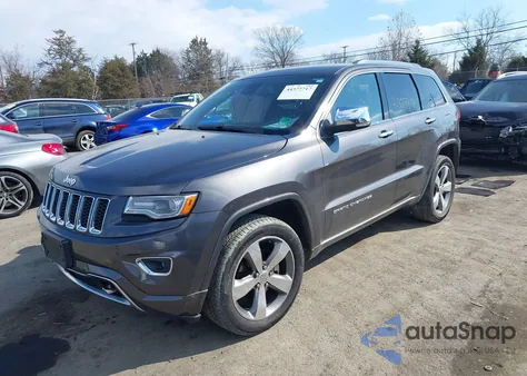 2014 Jeep Grand Cherokee Overland z USA, uszkodzony, nr VIN 1C4RJFCG6EC474380